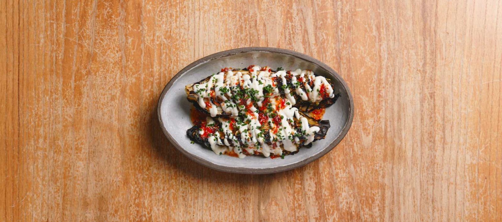 `Hispi cabbage with fermented hot honey lime tofu dressing at Amber restaurant Aldgate East`
